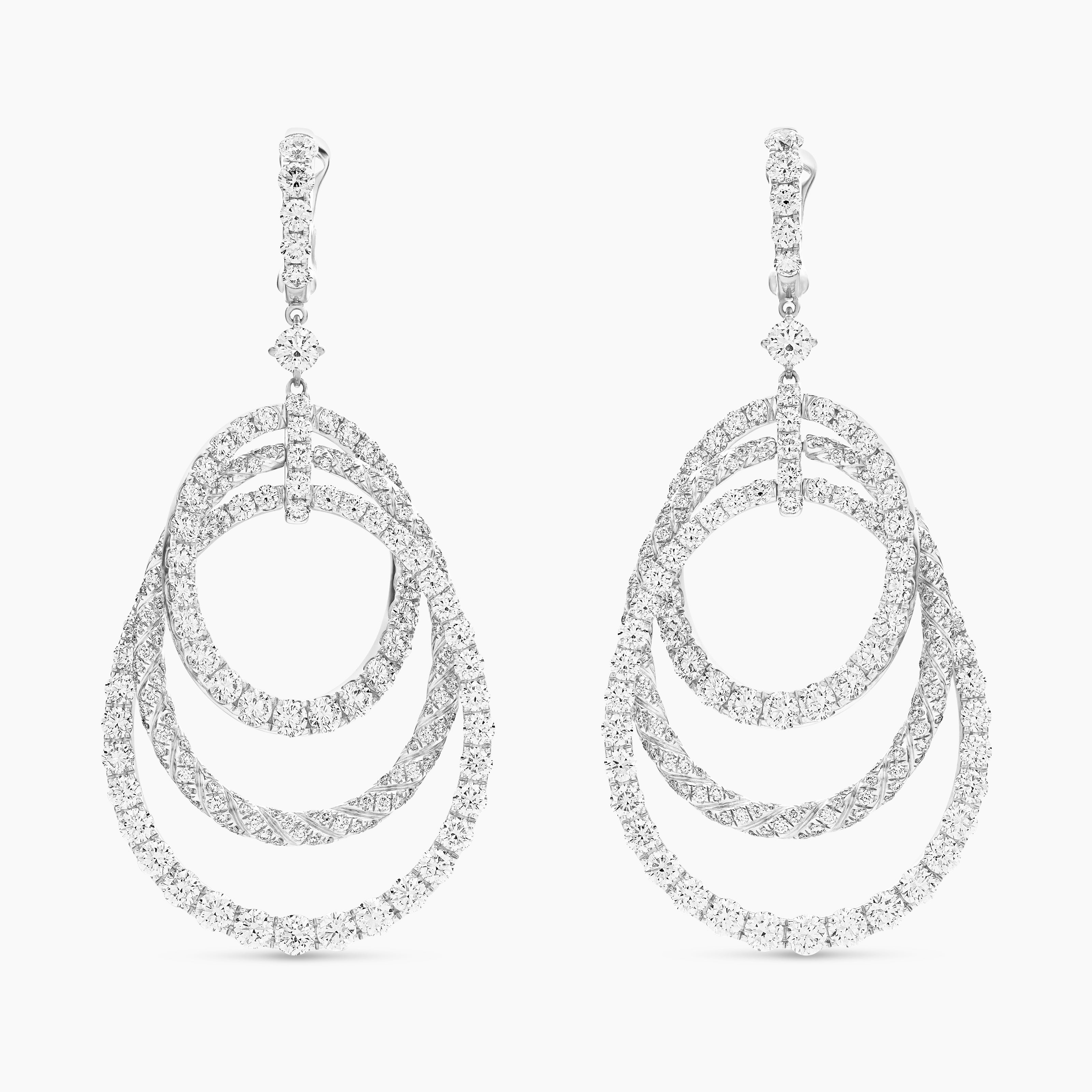 Womens Floating Diamonds Drop Earrings in White Gold